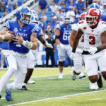 
              Youngstown State linebacker Alex Howard (3) chases down Kentucky quarterback Will Levis (7) during the second half of an NCAA college football game in Lexington, Ky., Saturday, Sept. 17, 2022. (AP Photo/Michael Clubb)
            
