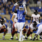 
              Kentucky wide receiver Chauncey Magwood (10) motions for the crowd to get louder during the first half of an NCAA college football game against Northern Illinois in Lexington, Ky., Saturday, Sept. 24, 2022. (AP Photo/Michael Clubb)
            