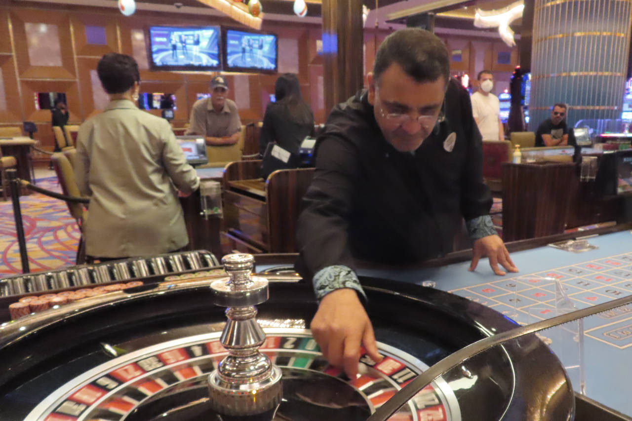 A dealer prepared to spin the ball during a game of roulette at the Hard Rock casino in Atlantic Ci...
