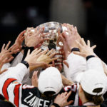 
              Canada's players receive the trophy after The IIHF World Championship Woman's ice hockey gold medal match between USA and Canada in Herning, Denmark, Sunday, Sept. 4, 2022. (Bo Amstrup/Ritzau Scanpix via AP)
            