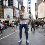 
              U.S. Open men's singles tennis champion Carlos Alcaraz poses in Times Square, Monday, Sept. 12, 2022, in New York. (AP Photo/Yuki Iwamura)
            