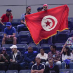 
              Tennis fans cheer on Ons Jabeur, of Tunisia, against Ajla Tomljanovic, of Austrailia, during the quarterfinals of the U.S. Open tennis championships, Tuesday, Sept. 6, 2022, in New York. (AP Photo/Seth Wenig)
            