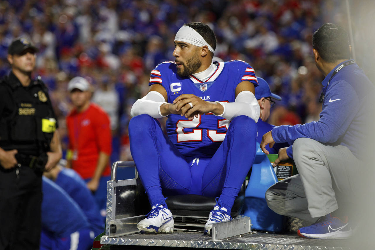 FILE - Buffalo Bills safety Micah Hyde (23) is carted off the field during an NFL football game on ...
