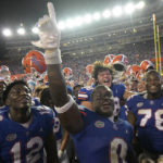 
              Florida safety Trey Dean III (0) and teammates celebrate after defeating Utah in an NCAA college football game, Saturday, Sept. 3, 2022, in Gainesville, Fla. (AP Photo/Phelan M. Ebenhack)
            