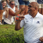 
              Penn State head coach James Franklin celebrates with fans after their victory over Auburn in an NCAA college football game, Saturday, Sept. 17, 2022, in Auburn, Ala. (AP Photo/Butch Dill)
            