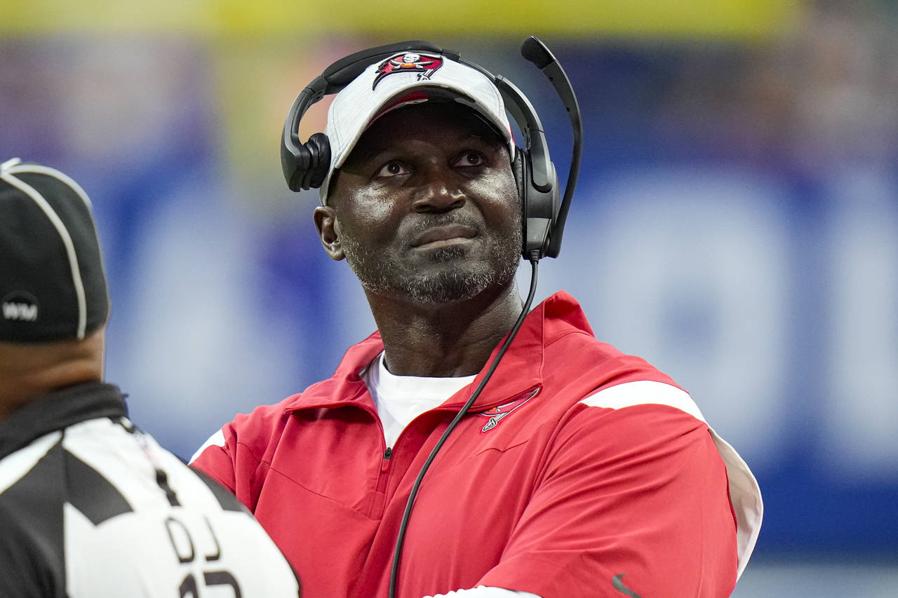 Tampa Bay Buccaneers head coach Todd Bowles checks the replay screen in the first half of an NFL pr...