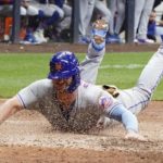 
              New York Mets' Pete Alonso slides safely home during the eighth inning of a baseball game against the Milwaukee Brewers Monday, Sept. 19, 2022, in Milwaukee. Alonso scored on a hit by Tyler Naquin. (AP Photo/Morry Gash)
            