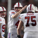 
              SMU kicker Collin Rogers, center, is congratulated after kicking a field goal against Maryland in the first half of an NCAA college football game, Saturday, Sept. 17, 2022, in College Park, Md. (AP Photo/Gail Burton)
            