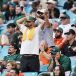
              Miami fans react after a play during the first half of an NCAA college football game against Middle Tennessee, Saturday, Sept. 24, 2022, in Miami Gardens, Fla. (AP Photo/Wilfredo Lee)
            