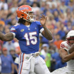 
              Florida quarterback Anthony Richardson (15) looks to throw a pass during the first half of an NCAA college football game against Utah, Saturday, Sept. 3, 2022, in Gainesville, Fla. (AP Photo/Phelan M. Ebenhack)
            