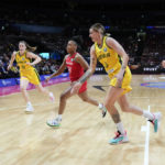 
              Players chase after the ball during the bronze medal game between Australia and Canada at the women's Basketball World Cup in Sydney, Australia, Saturday, Oct. 1, 2022. (AP Photo/Mark Baker)
            