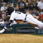 
              Detroit Tigers' Javier Baez dives into third base with a triple against the Chicago White Sox during the fifth inning of a baseball game Friday, Sept. 16, 2022, in Detroit. (AP Photo/Duane Burleson)
            