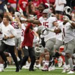 
              Washington State players celebrate after an NCAA college football game against WisconsinSaturday, Sept. 10, 2022, in Madison, Wis. Washington State won 17-14. (AP Photo/Morry Gash)
            