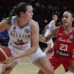 
              Belgium's Billie Massey looks to pass the ball past Puerto Rico's Trinity San Antonio during their game at the women's Basketball World Cup in Sydney, Australia, Saturday, Sept. 24, 2022. (AP Photo/Mark Baker)
            