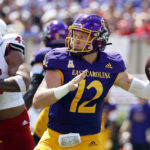 
              East Carolina's Holton Ahlers (12) looks to pass the ball against North Carolina State during the first half of an NCAA college football game in Greenville, N.C., Saturday, Sept. 3, 2022. (AP Photo/Karl B DeBlaker)
            