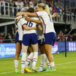 
              United States players celebrate a goal by Rose Lavelle, center, against Nigeria during the second half of an international friendly soccer match, Tuesday, Sept. 6, 2022, in Washington. (AP Photo/Julio Cortez)
            