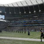 
              FILE - Jacksonville Jaguars quarterback Trevor Lawrence (16) runs onto the field for an NFL football game between the Miami Dolphins and the Jaguars at the Tottenham Hotspur stadium in London on Oct. 17, 2021. Folks in soccer-mad Britain have a growing hankering for the U.S. brand of football, brought to their world with a big push from the NFL and an increasingly diverse media landscape. “It's a good sport. It's got violence. It's got scoring,” said Joe Vincent, a Welshman who set up the Jacksonville Jaguars fan club in Britain. “Once you've gone to a game, you're hooked.” (AP Photo/Matt Dunham, File)
            