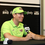 
              Kyle Busch answers a question from a reporter during a media availability before a NASCAR Cup Series auto race at Daytona International Speedway, Saturday, Aug. 27, 2022, in Daytona Beach, Fla. (AP Photo/Terry Renna)
            