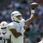 
              Miami Dolphins quarterback Tua Tagovailoa (1) aims a pass during the first half of an NFL football game against the Buffalo Bills, Sunday, Sept. 25, 2022, in Miami Gardens. (AP Photo/Rebecca Blackwell)
            