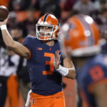 
              Illinois quarterback Tommy DeVito throws a pass during the first half of the team's NCAA college football game against Chattanooga on Thursday, Sept. 22, 2022, in Champaign, Ill. (AP Photo/Charles Rex Arbogast)
            