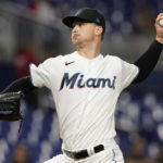 
              Miami Marlins starting pitcher Braxton Garrett throws in the first inning during Game 2 of a doubleheader baseball game against the Texas Rangers, Monday, Sept. 12, 2022, in Miami. (AP Photo/Lynne Sladky)
            