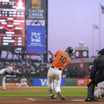 
              San Francisco Giants' Evan Longoria (10) hits an RBI double against the Philadelphia Phillies during the first inning of a baseball game in San Francisco, Friday, Sept. 2, 2022. (AP Photo/Godofredo A. Vásquez)
            