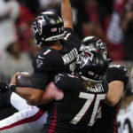 
              Atlanta Falcons quarterback Marcus Mariota (1) celebrates his touchdown against the New Orleans Saints during the second half of an NFL football game, Sunday, Sept. 11, 2022, in Atlanta. (AP Photo/Brynn Anderson)
            