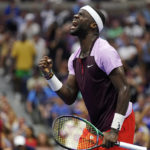 
              Frances Tiafoe, of the United States, celebrates after winning a point against Rafael Nadal, of Spain, during the fourth round of the U.S. Open tennis championships, Monday, Sept. 5, 2022, in New York. (AP Photo/Julia Nikhinson)
            