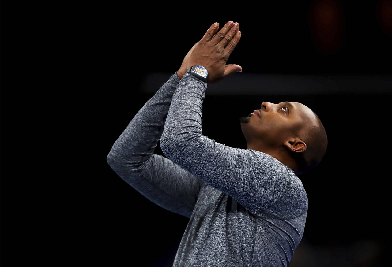 FILE - Memphis coach Penny Hardaway gestures during an NCAA college basketball game against Tulsa o...