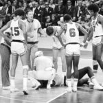 
              FILE - U.S. player James Brewer is checked after a hard fall during the team's men's basketball final against the Soviet Union at the Olympics in Munich, Sept. 10, 1972. Russia won 51-50. Members of the 1972 U.S. Olympic men's basketball team have talked about finally retrieving those silver medals they vowed to never accept and left behind in Germany. No, they still don't want them for themselves. They believe the medals belong in the Naismith Memorial Basketball Hall of Fame, but the latest attempt to get them from the International Olympic Committee has been thwarted. (AP Photo, File)
            