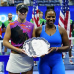 
              Taylor Townsend, of the United States, right, and Caty McNally, of the United States, pose with the runner-up trophy after being defeated by Barbora Krejcikova, of the Czech Republic, and Katerina Siniakova, of the Czech Republic in the final of the women's doubles at the U.S. Open tennis championships, Sunday, Sept. 11, 2022, in New York. (AP Photo/Matt Rourke)
            