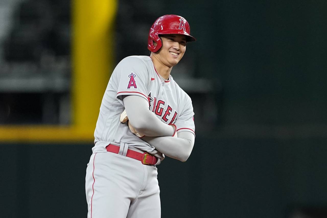 Los Angeles Angels' Shohei Ohtani stands on second after hitting a double in the ninth inning of a ...