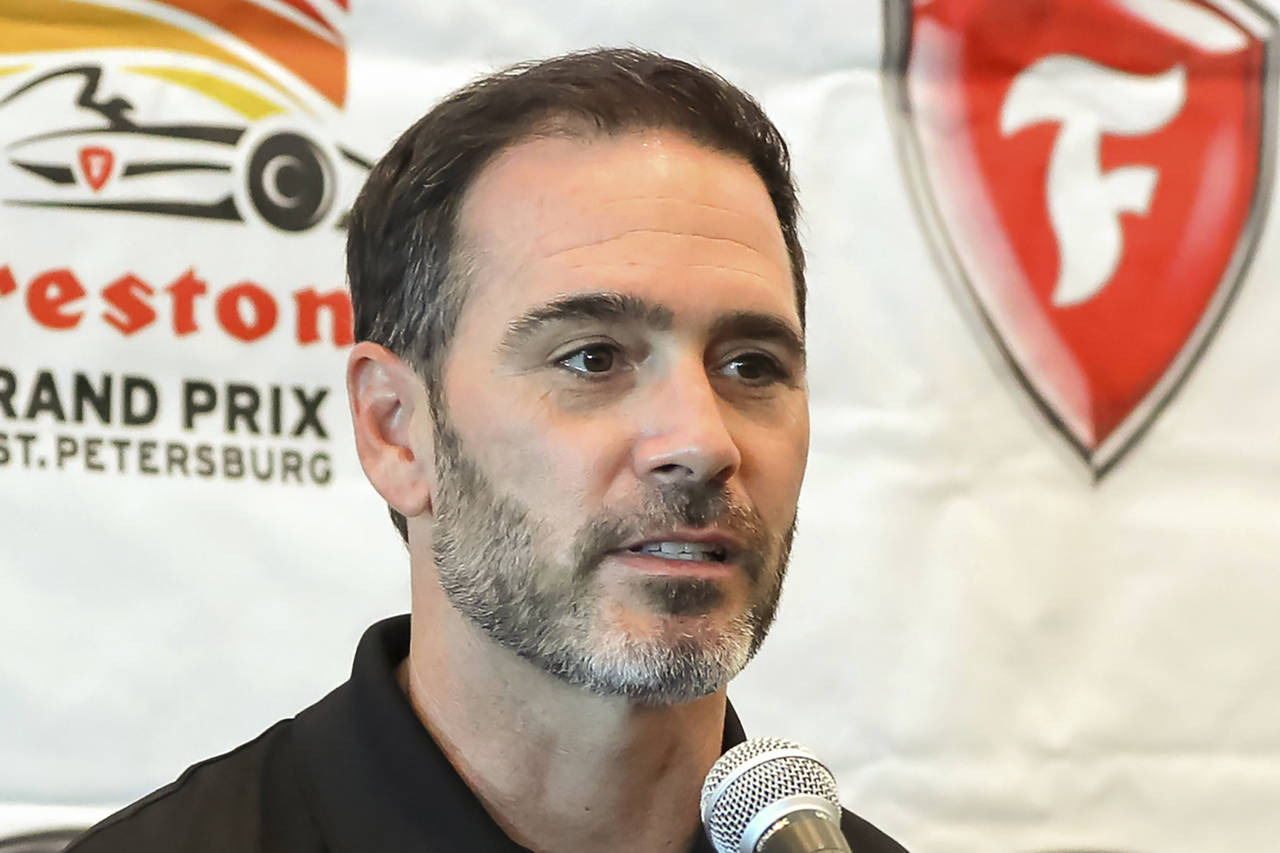 FILE - Jimmie Johnson speaks about joining the team of Chip Ganassi for the IndyCar series at a pre...