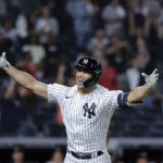 
              New York Yankees' Giancarlo Stanton gestures after his grand slam against the Pittsburgh Pirates during the ninth inning of a baseball game Tuesday, Sept. 20, 2022, in New York. (AP Photo/Jessie Alcheh)
            