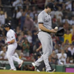 
              New York Yankees' Gerrit Cole, right, walks near the mound as Boston Red Sox's Triston Casas, left, runs the bases after hitting a two-run home run during the second inning of a baseball game Tuesday, Sept. 13, 2022, in Boston. (AP Photo/Steven Senne)
            