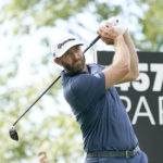 
              Dustin Johnson watches his tee shot on the fourth hole during the final round of the LIV Golf Invitational-Chicago tournament Sunday, Sept. 18, 2022, in Sugar Hill, Ill. (AP Photo/Charles Rex Arbogast)
            