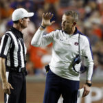 
              Auburn head coach Bryan Harsin talks with the referee Ken Williamson during the second half of an NCAA college football game against San Jose State Saturday, Sept. 10, 2022, in Auburn, Ala. (AP Photo/Butch Dill)
            