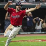 
              Cleveland Guardians' Austin Hedges reacts after scoring the winning run against the Minnesota Twins in the 15th inning of the second game of a baseball doubleheader in Cleveland, early Sunday, Sept. 18, 2022. (AP Photo/Phil Long)
            