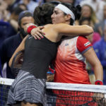 
              Ons Jabeur, of Tunisia, right, hugs Caroline Garcia, of France, after winning their semifinal match of the U.S. Open tennis championships, Thursday, Sept. 8, 2022, in New York. (AP Photo/John Minchillo)
            