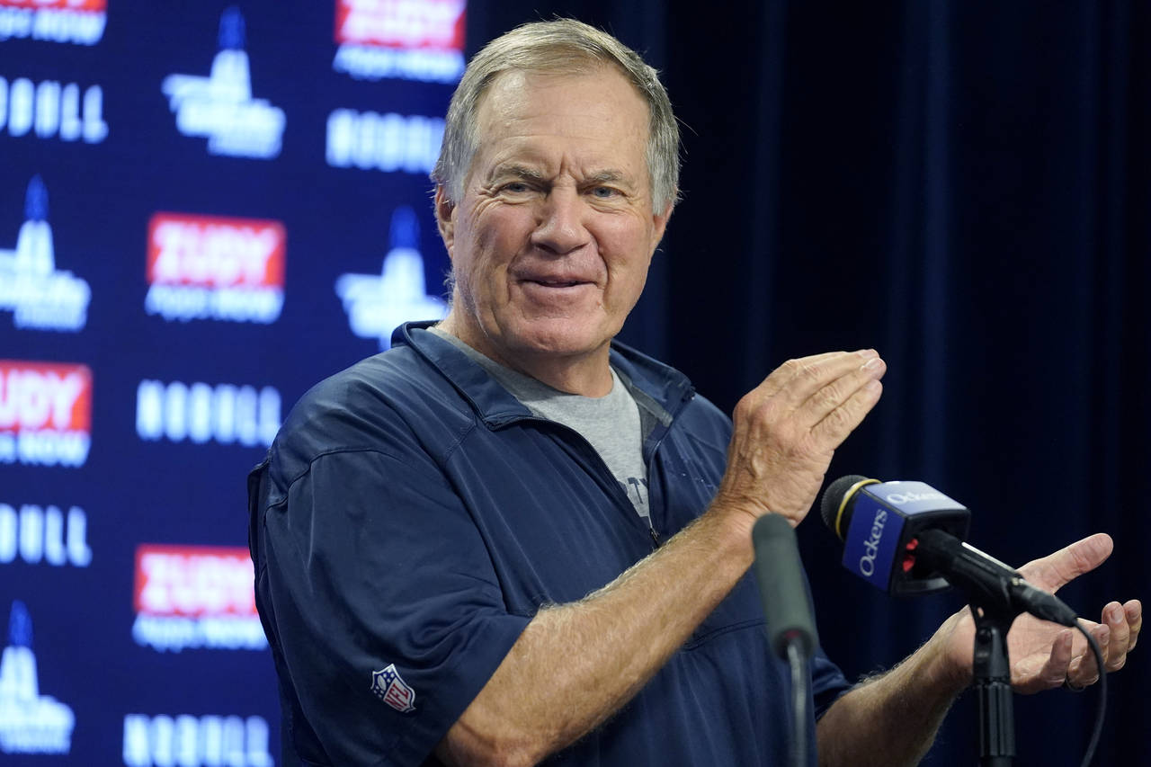 New England Patriots head coach Bill Belichick faces reporters Monday, Aug. 29, 2022, at the NFL fo...