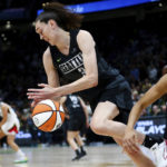 
              Seattle Storm forward Breanna Stewart, left, grabs the ball away from Las Vegas Aces center Kiah Stokes, right, during the first half in Game 3 of a WNBA basketball semifinal playoff series Sunday, Sept. 4, 2022, in Seattle. (AP Photo/Lindsey Wasson)
            