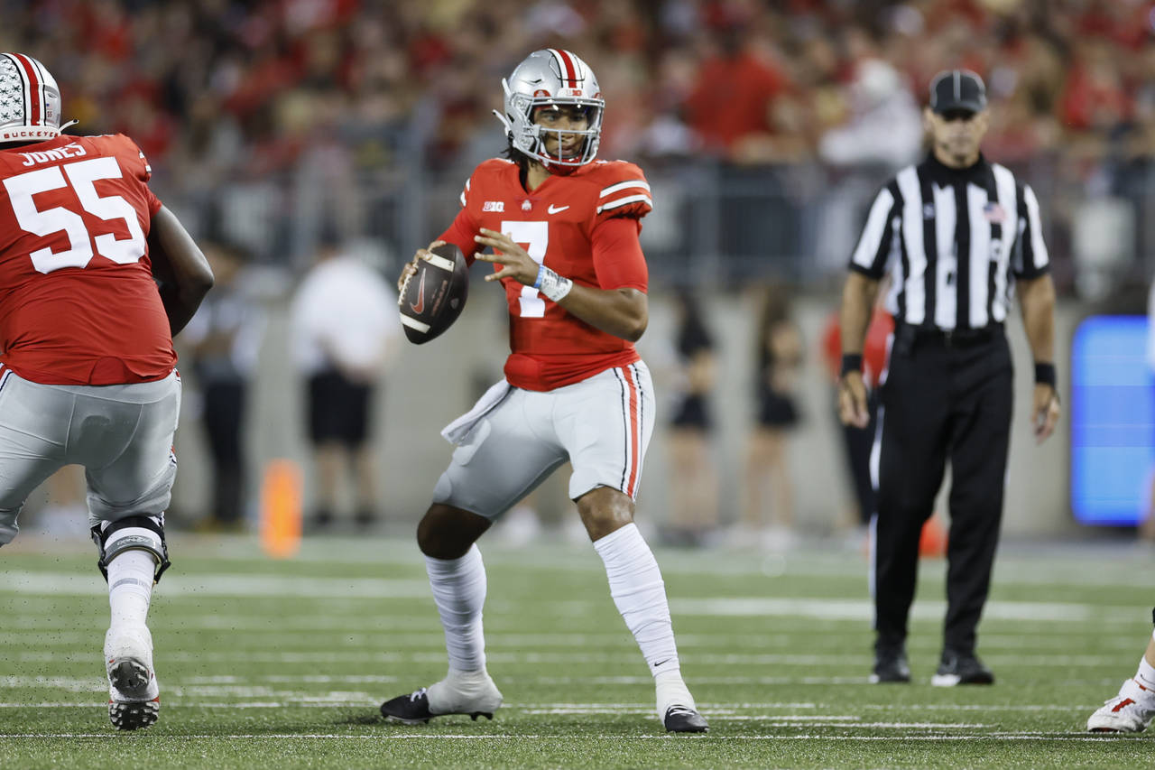 Ohio State quarterback C.J. Stroud drops back to pass against Toledo during the first half of an NC...