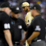 
              Arizona Diamondbacks' starting pitcher Madison Bumgarner waits to pitch as the umpires confer during the third inning of a baseball game agaisnt the San Diego Padres, Friday, Sept. 16, 2022, in Phoenix. (AP Photo/Matt York)
            
