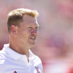 
              Nebraska head coach Scott Frost talks on the sideline as his team warms up before playing against North Dakota in an NCAA college football game Saturday, Sept. 3, 2022, in Lincoln, Neb. (AP Photo/Rebecca S. Gratz)
            