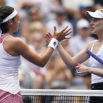 
              Caroline Garcia, of France, left, is congratulated by Alison Riske, of the United States, after victory during the fourth round of the U.S. Open tennis championships, Sunday, Sept. 4, 2022, in New York. (AP Photo/Julia Nikhinson)
            