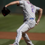 
              New York Mets starting pitcher Max Scherzer (21) throws in the first inning of a baseball game against the Oakland Athletics in Oakland, Calif., on Sunday, Sept. 25, 2022. (AP Photo/Scot Tucker)
            
