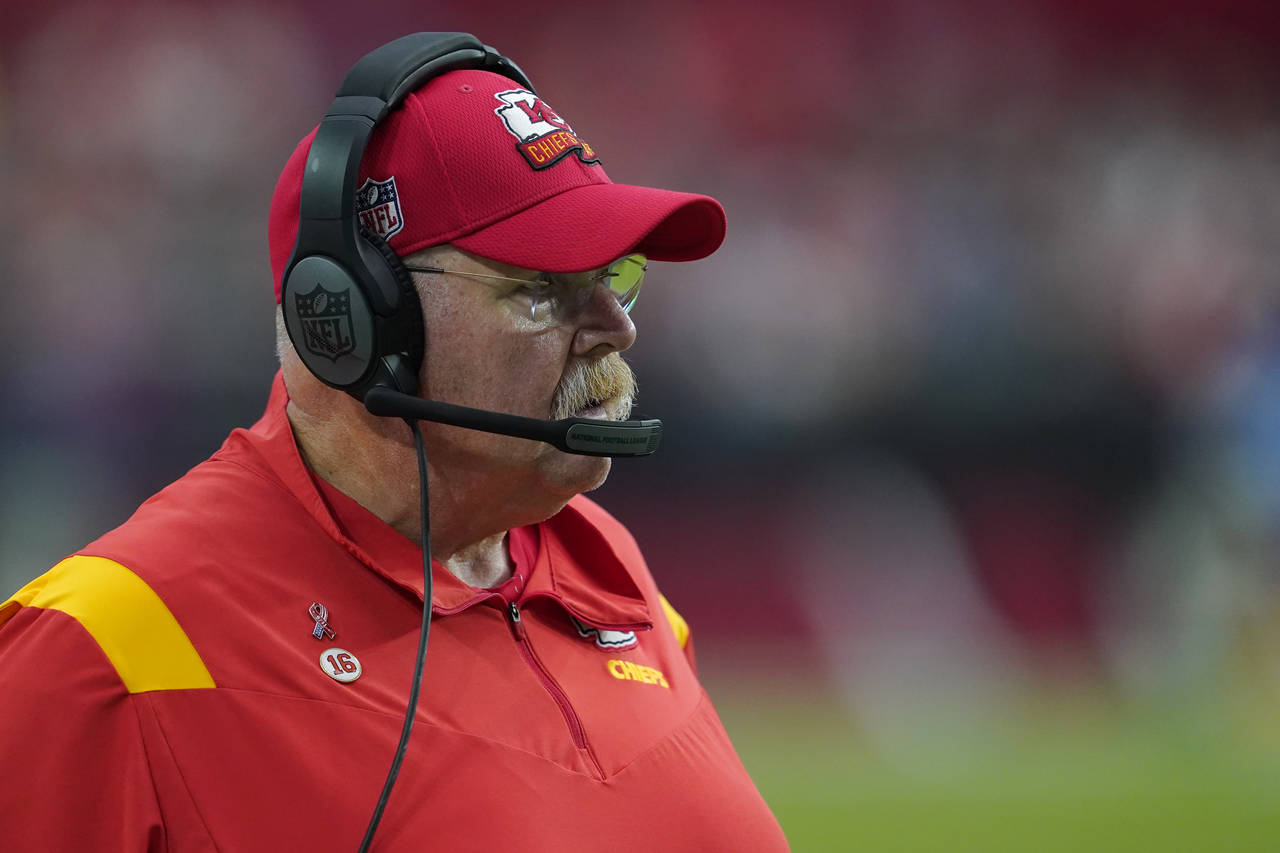Kansas City Chiefs head coach Andy Reid watches during the second half of an NFL football game agai...