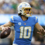 
              Los Angeles Chargers quarterback Justin Herbert (10) passes against the Jacksonville Jaguars during the first half of an NFL football game in Inglewood, Calif., Sunday, Sept. 25, 2022. (AP Photo/Marcio Jose Sanchez)
            