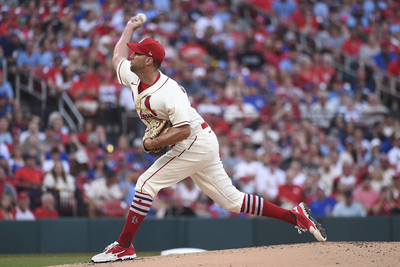 St. Louis Cardinals starting pitcher Adam Wainwright throws during the first inning of a baseball g...