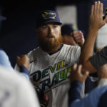 
              Tampa Bay Rays starting pitcher Drew Rasmussen walks into the dugout after being removed during the seventh inning of the team's baseball game against the Toronto Blue Jays on Saturday, Sept. 24, 2022, in St. Petersburg, Fla. (AP Photo/Scott Audette)
            